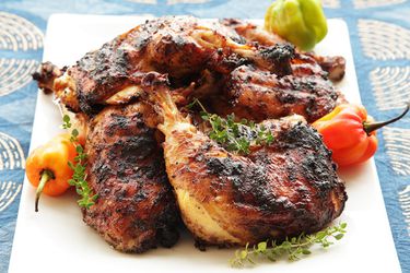 Platter of grilled jerk chicken