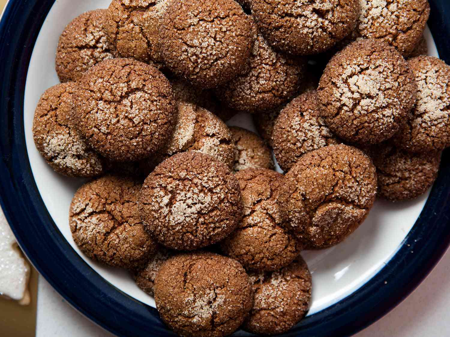 Top down view of a plate of gingersnaps.