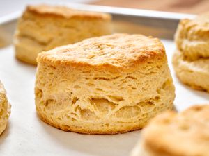 A close up of a freshly baked buttermilk biscuit