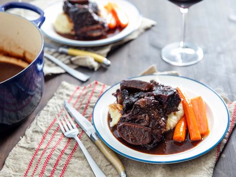 red wine braised short ribs on a white plate