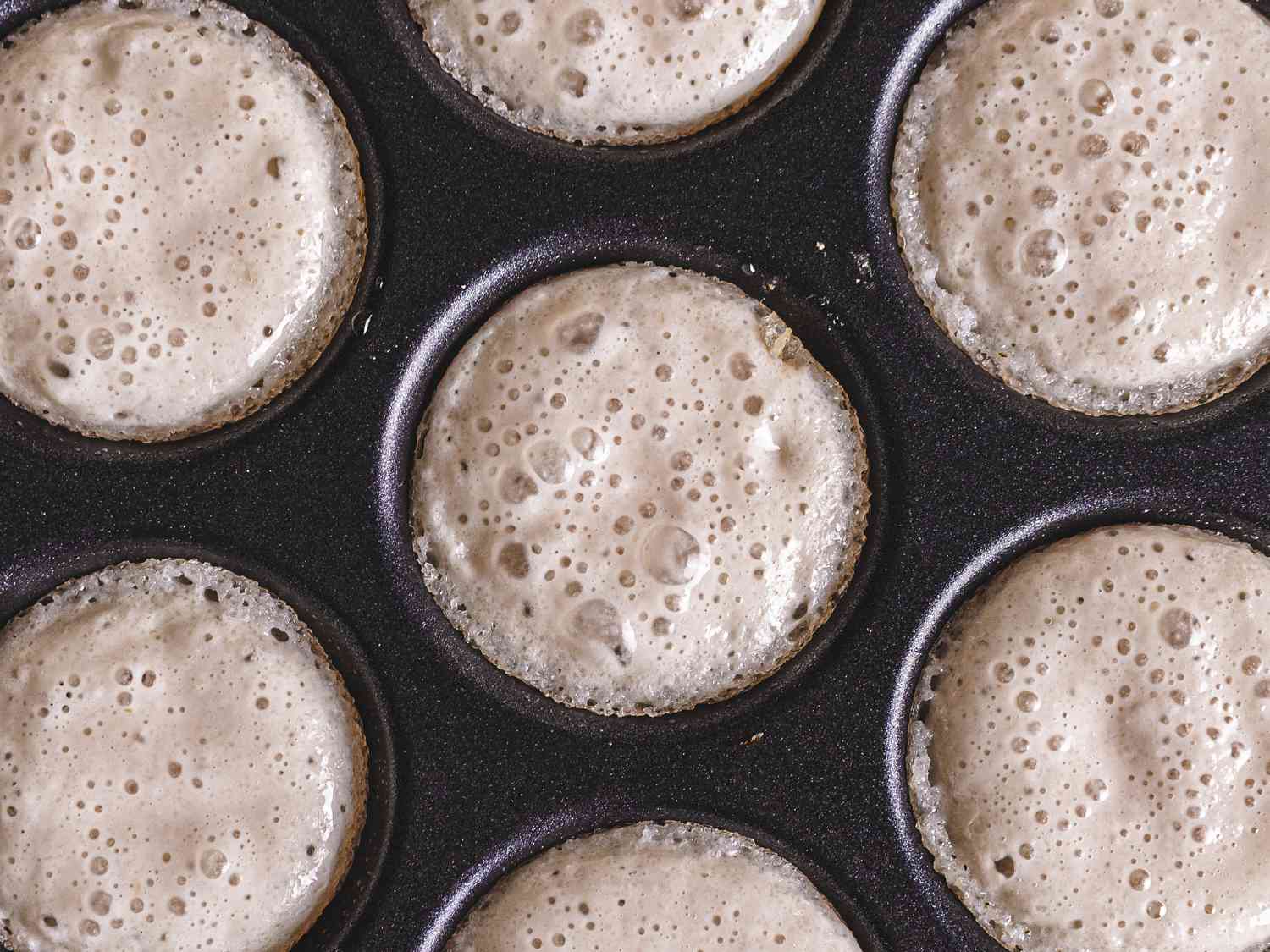 Close up of batter being cooked in pan