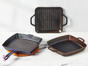 three grill pans on a kitchen countertop