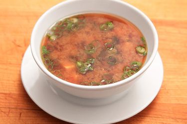 A white bowl of easy, one-pot miso soup.