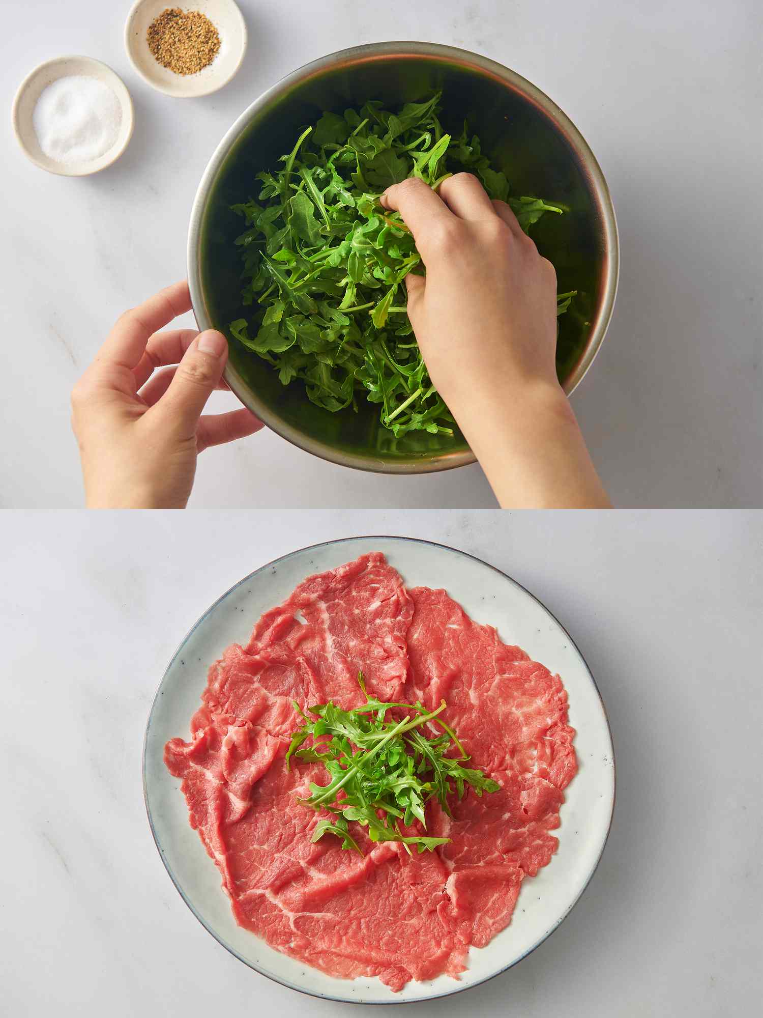 芝麻菜用橄榄油、盐和胡椒拌在碗里，芝麻菜和牛肉片一起放在盘子里