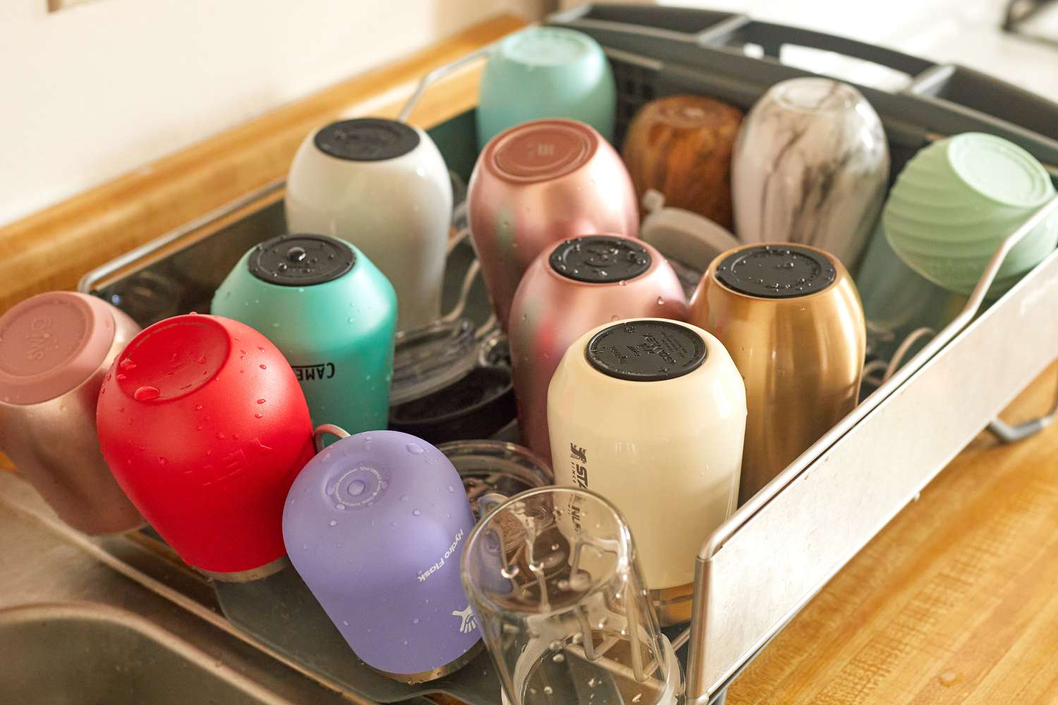 several wine tumblers in a dish rack