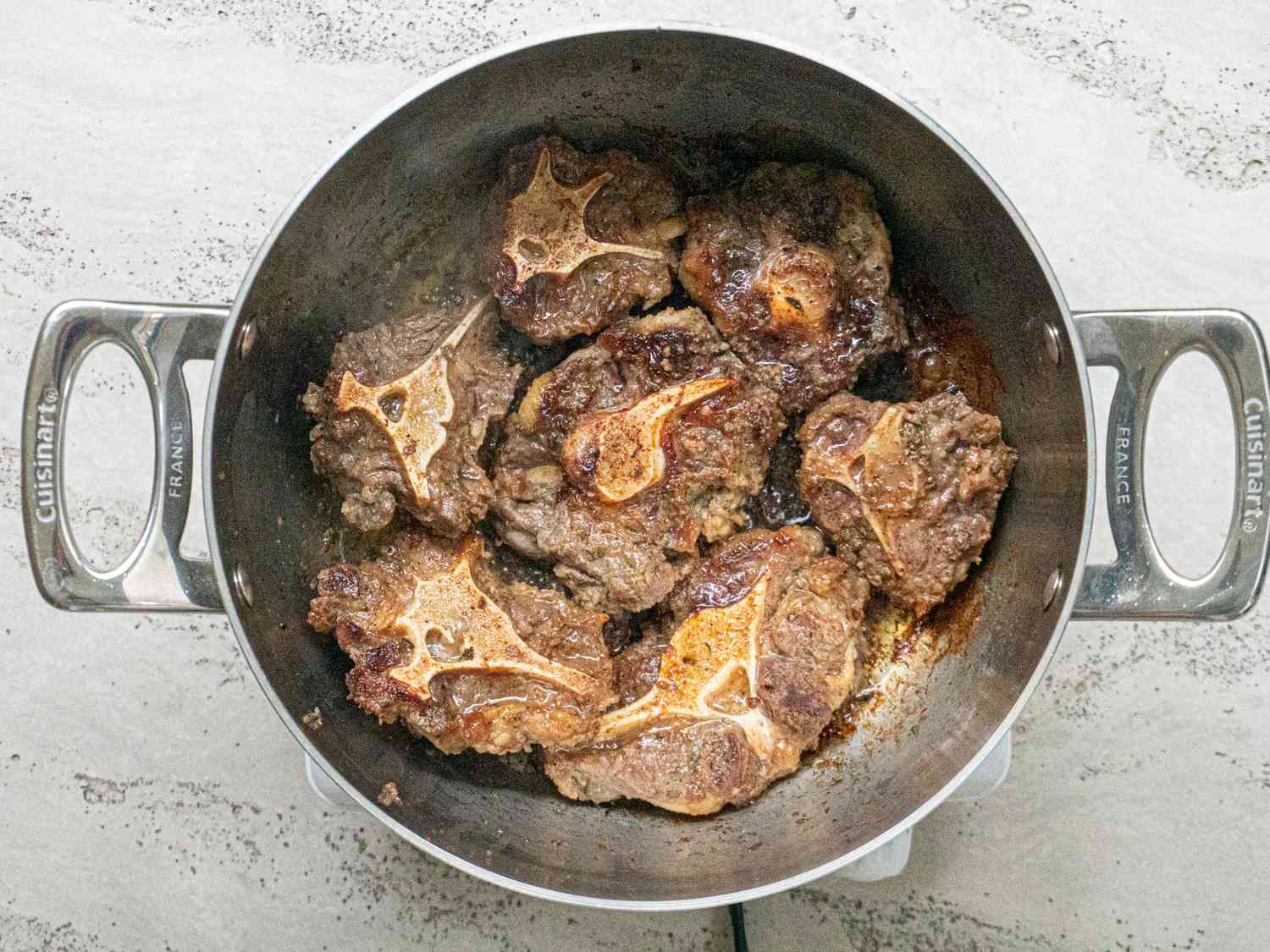 Oxtail browned in pot