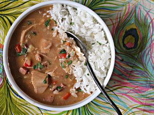 Overhead view of a bowl of low cooker turkey gumbo with rice