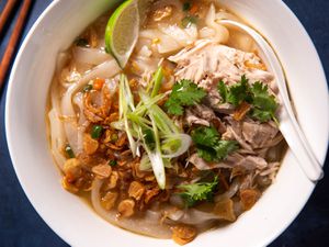 Bowl of khao piak sen (Lao chicken noodle soup)