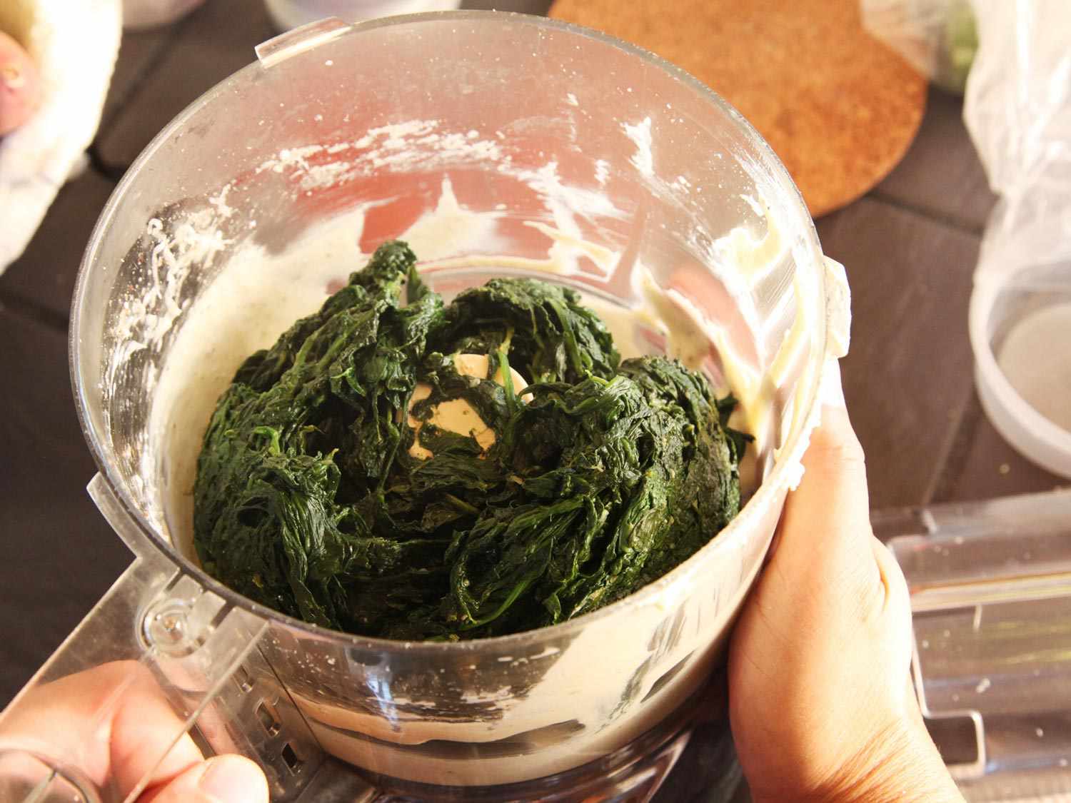 Sauteed spinach chopped in a food processor