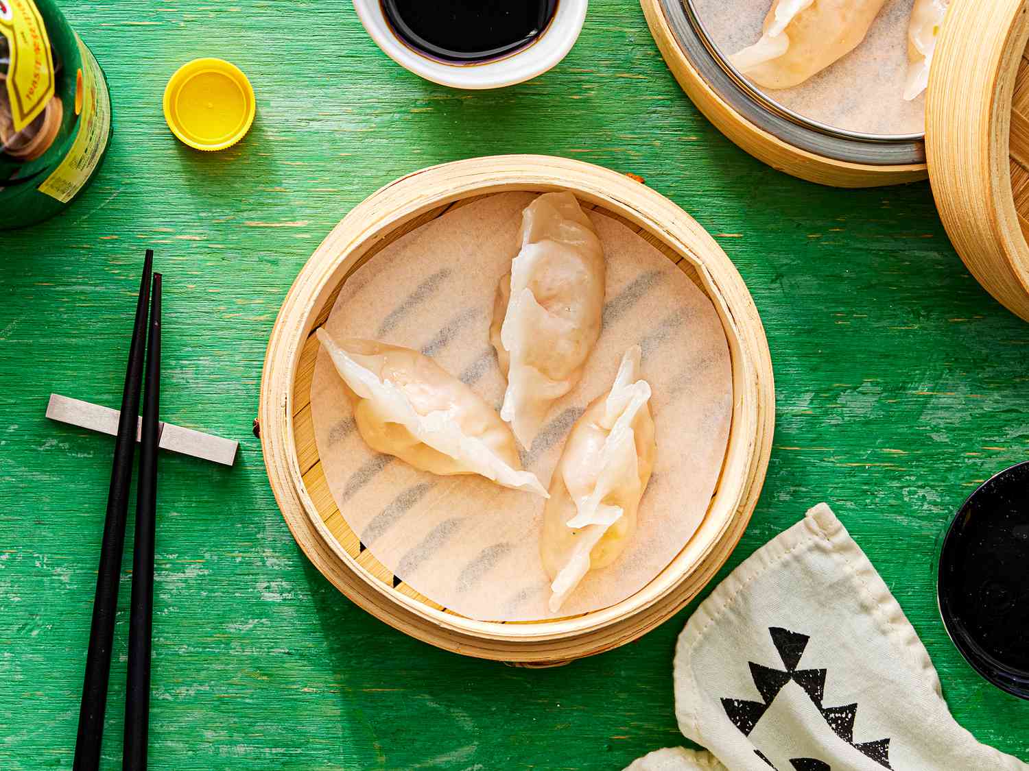 Overhead view of dumplings in steamer