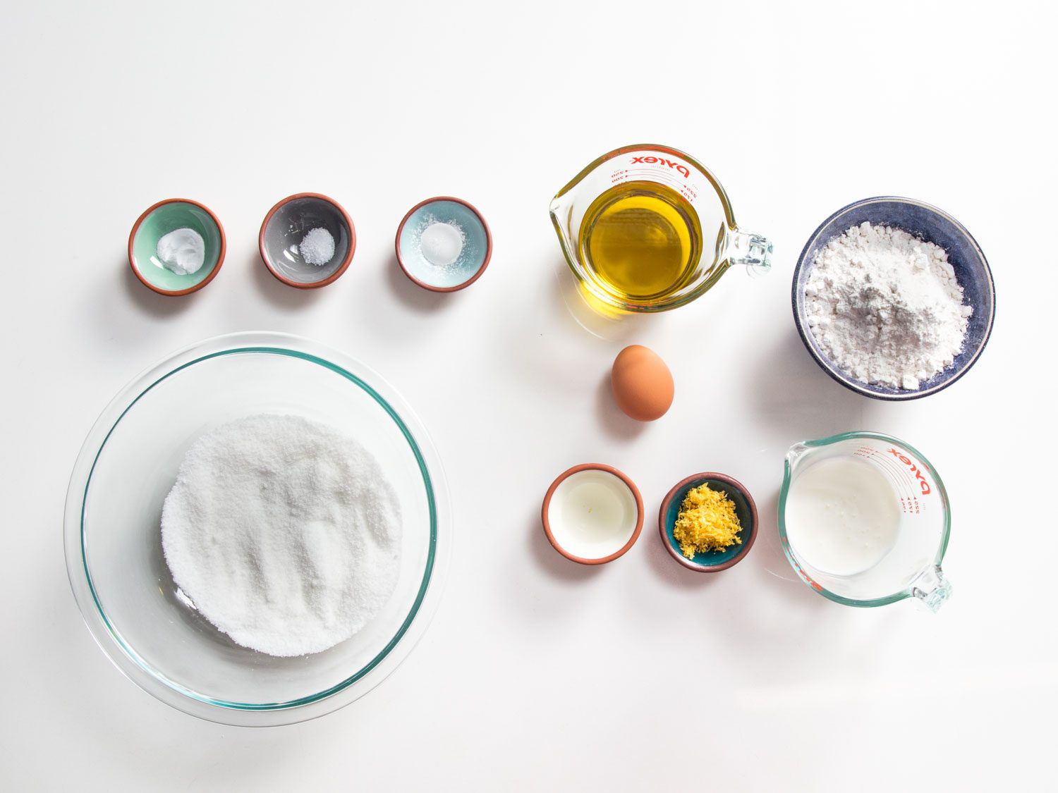 An above view of all of the ingredients for the olive oil cake.