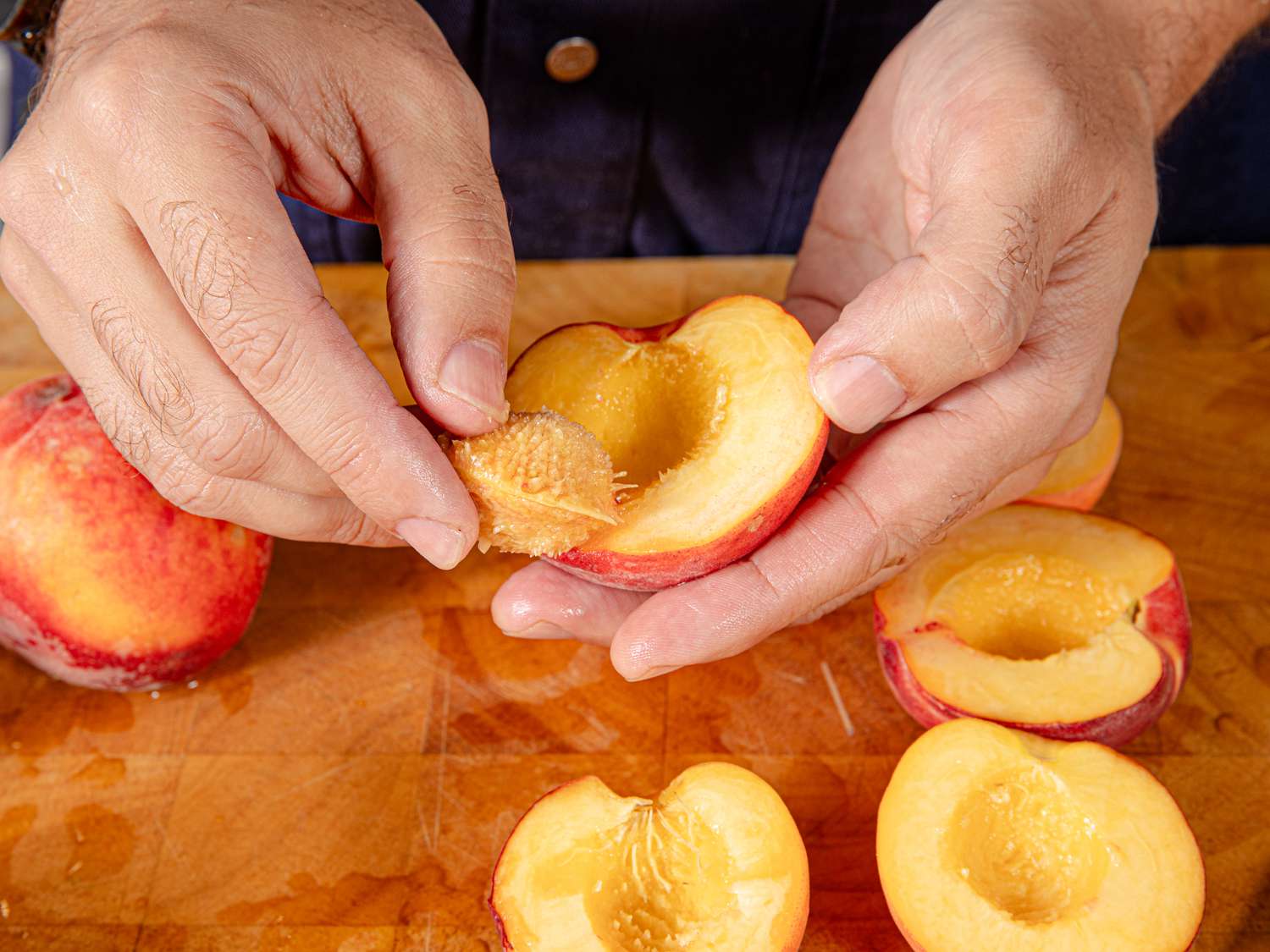 Removing the pit from a peach