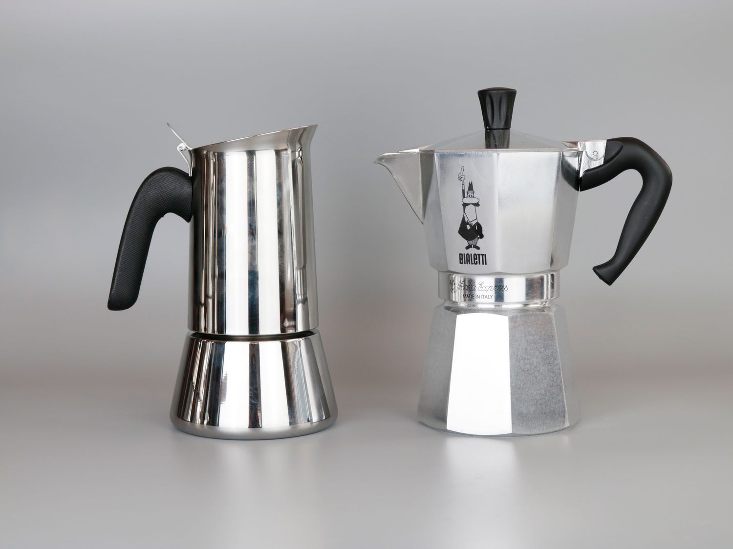 a round and a hexagonal moka pot side by side