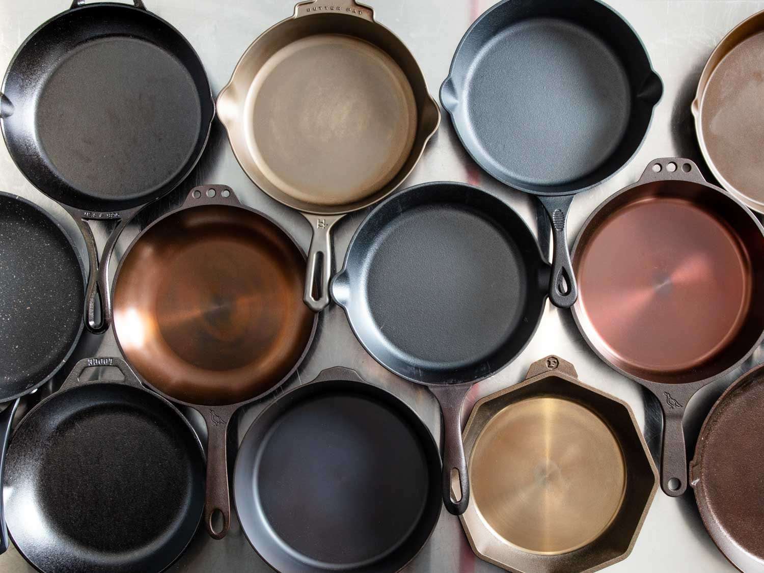 An overhead view of many of the cast iron skillets in this test, before they were used to cook anything.