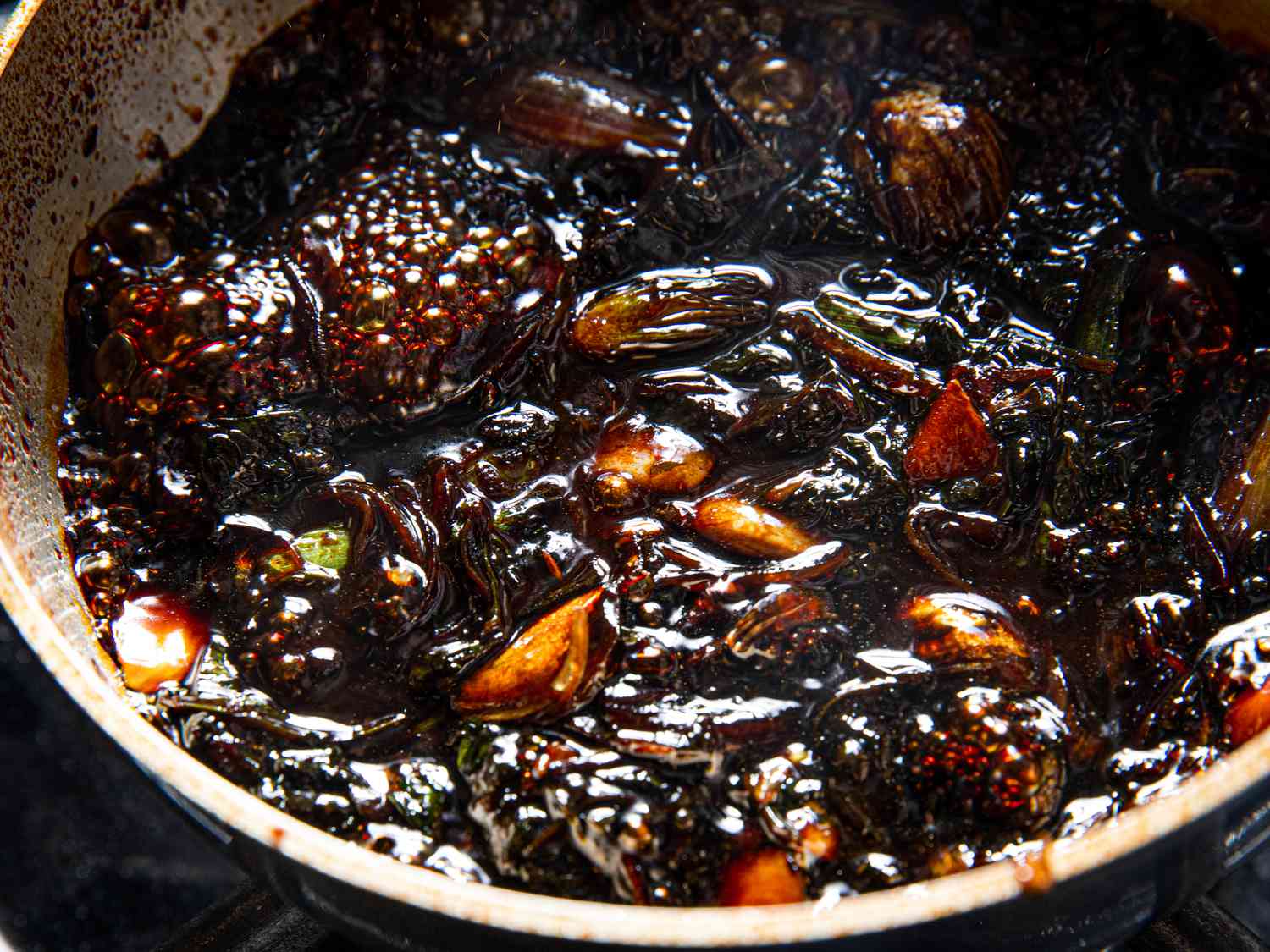 Close-up shot of seasoned soy sauce in a saucepan.