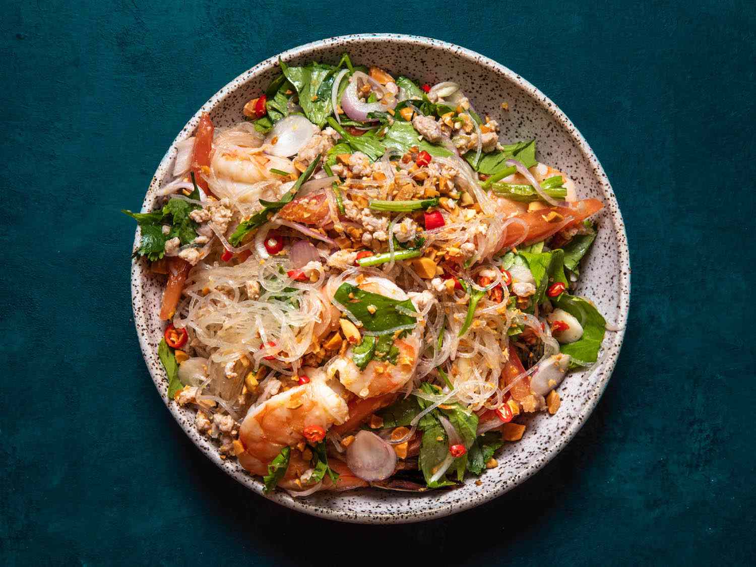 A serving bowl of yam woon sen with shrimp.