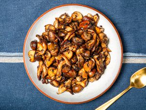 Overhead view of a plate of sauteed mushrooms