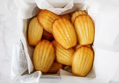 Overhead view of madeleines in box