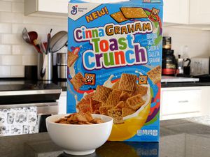 Box of General Mills' Cinnagraham Toast Crunch cereal on a kitchen counter