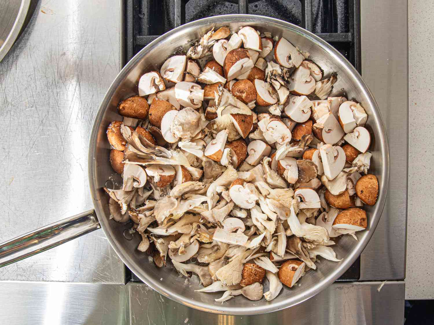 Overhead view of mushrooms in pan