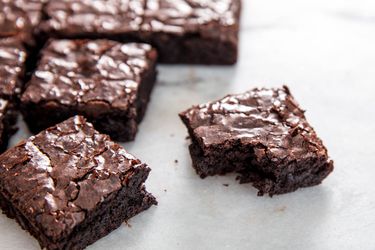 Brownies with crackly tops made from a homemade brownie mix