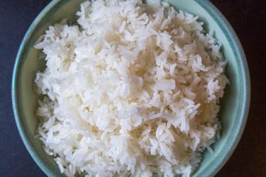 An overhead view of a bowl of perfectly cooked jasmine rice.