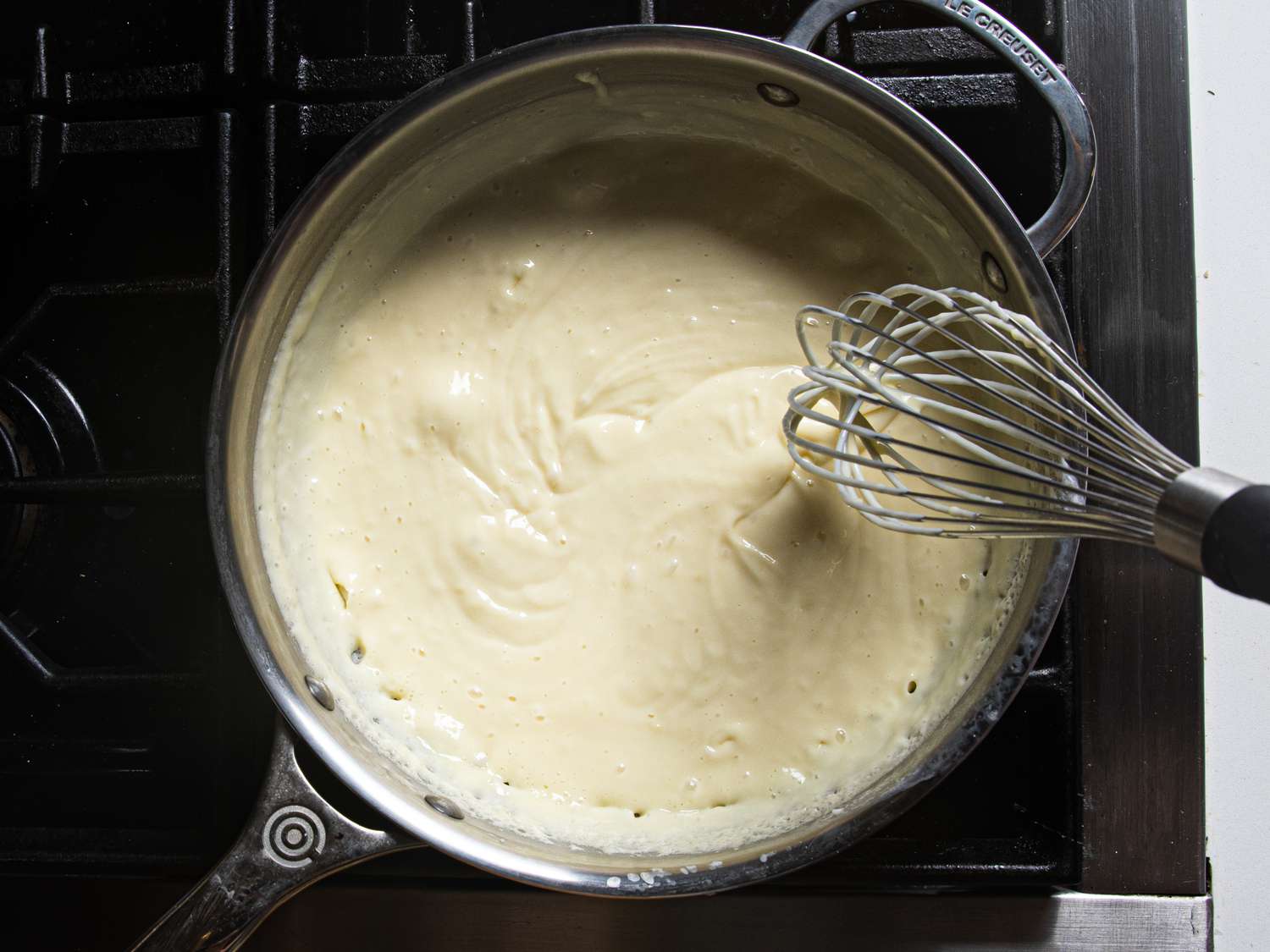 Stirring creme in pot