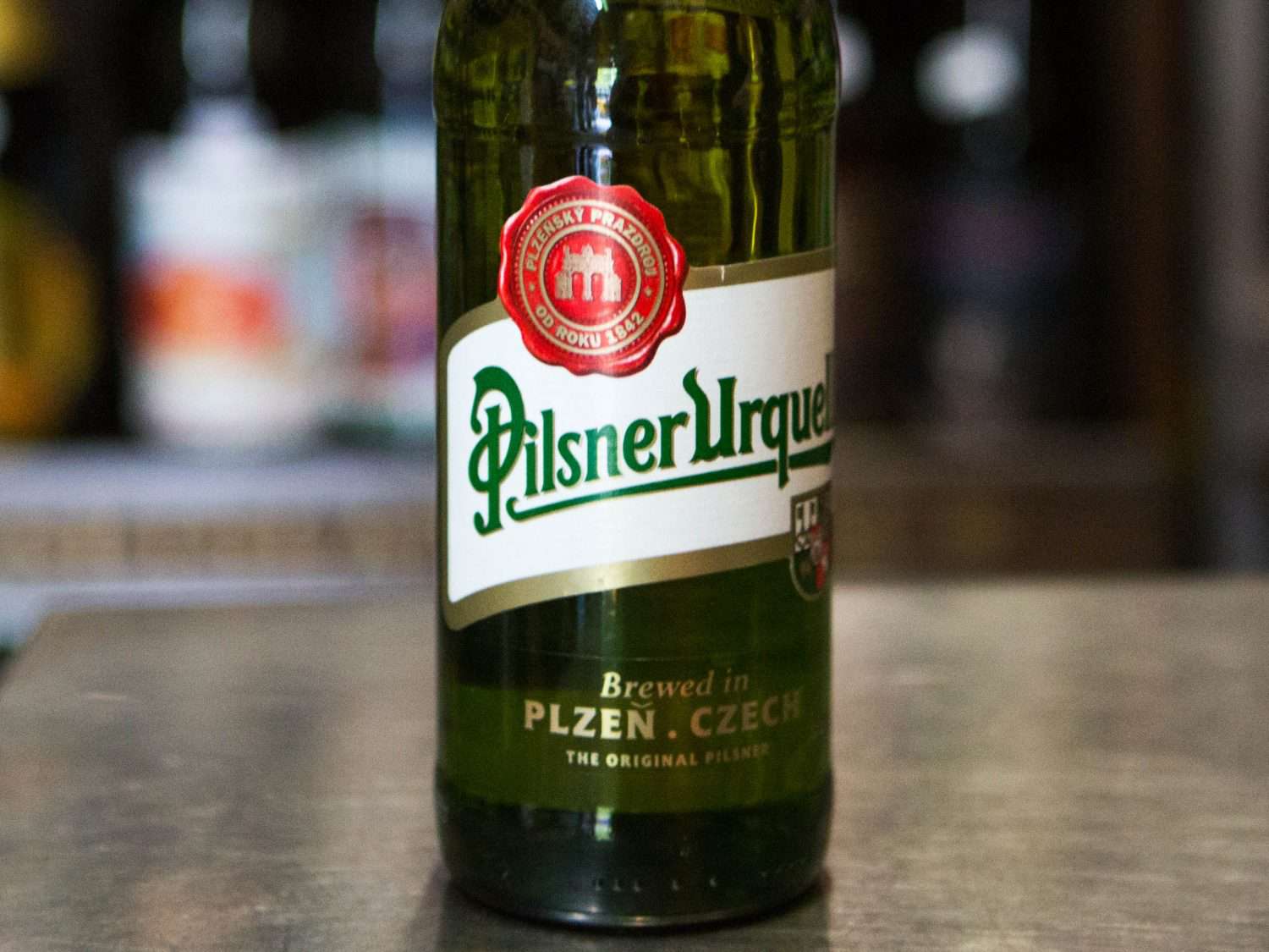Closeup of a the label on a bottle of Czech pilsner (Pilsner Urquell).