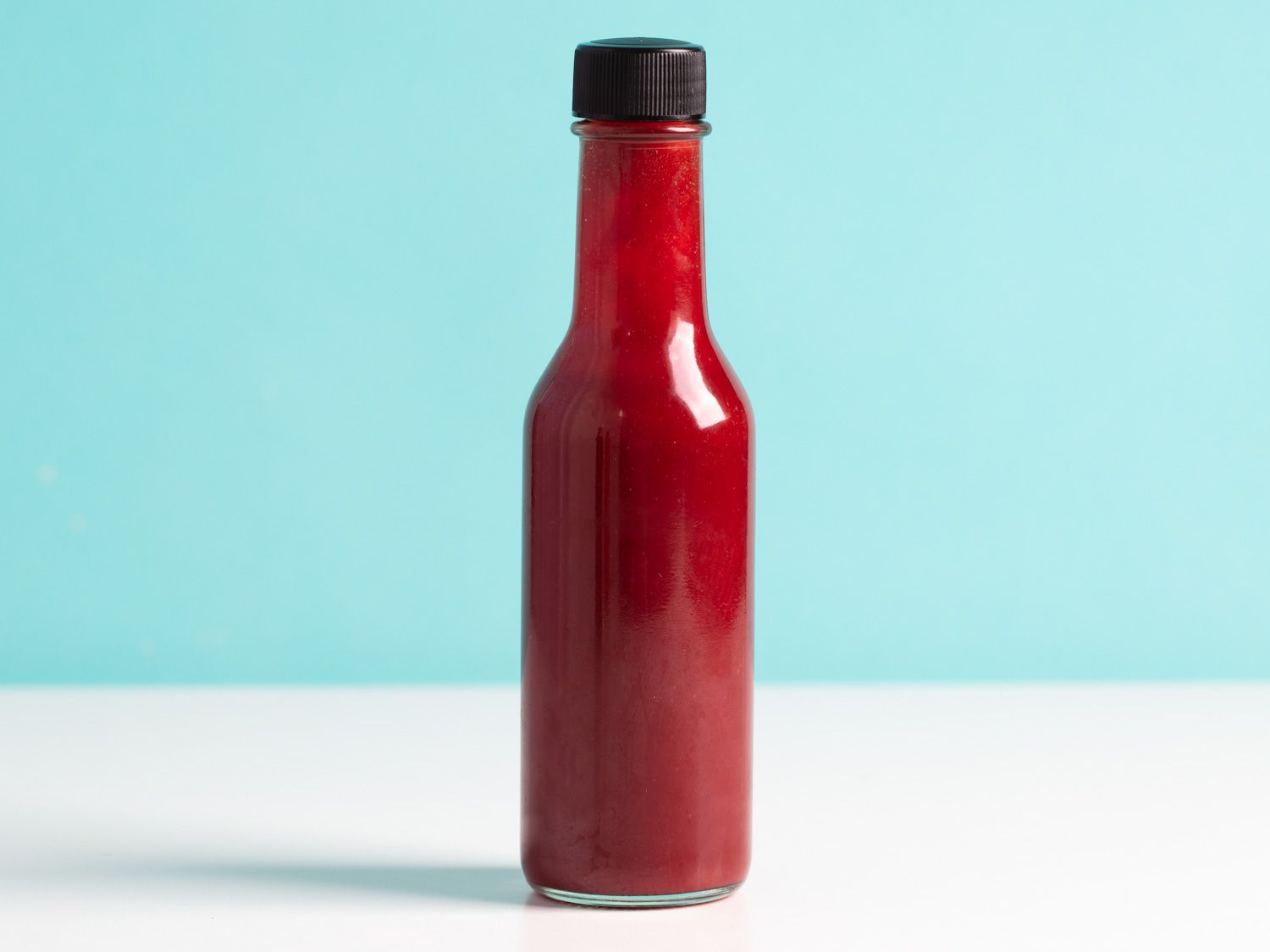 Double berry habanero fermented hot sauce in a bottle