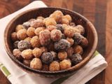 Wooden serving bowl of salt-crusted assorted new potatoes