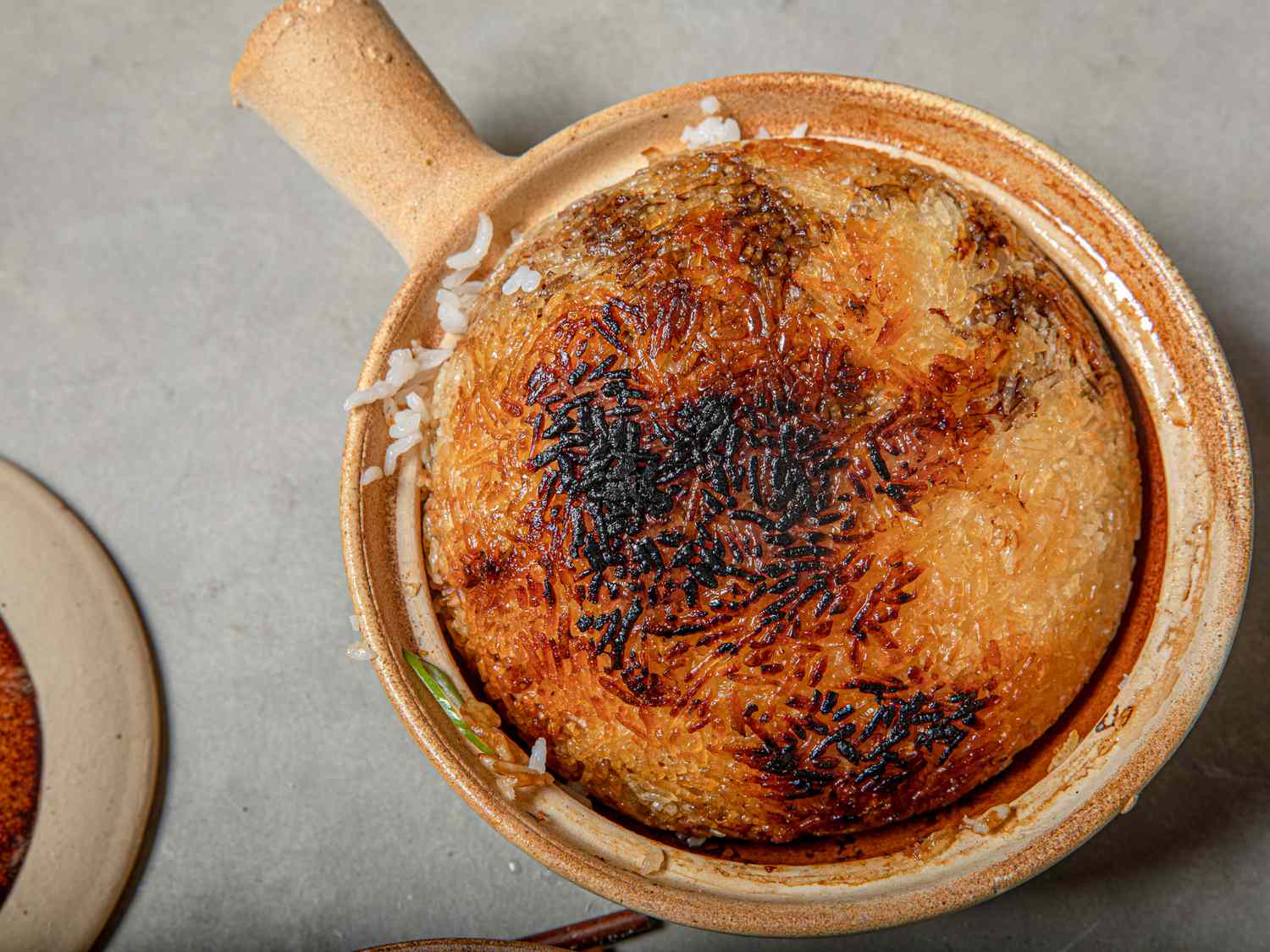 Crispy rice made in a Cantonese clay pot.