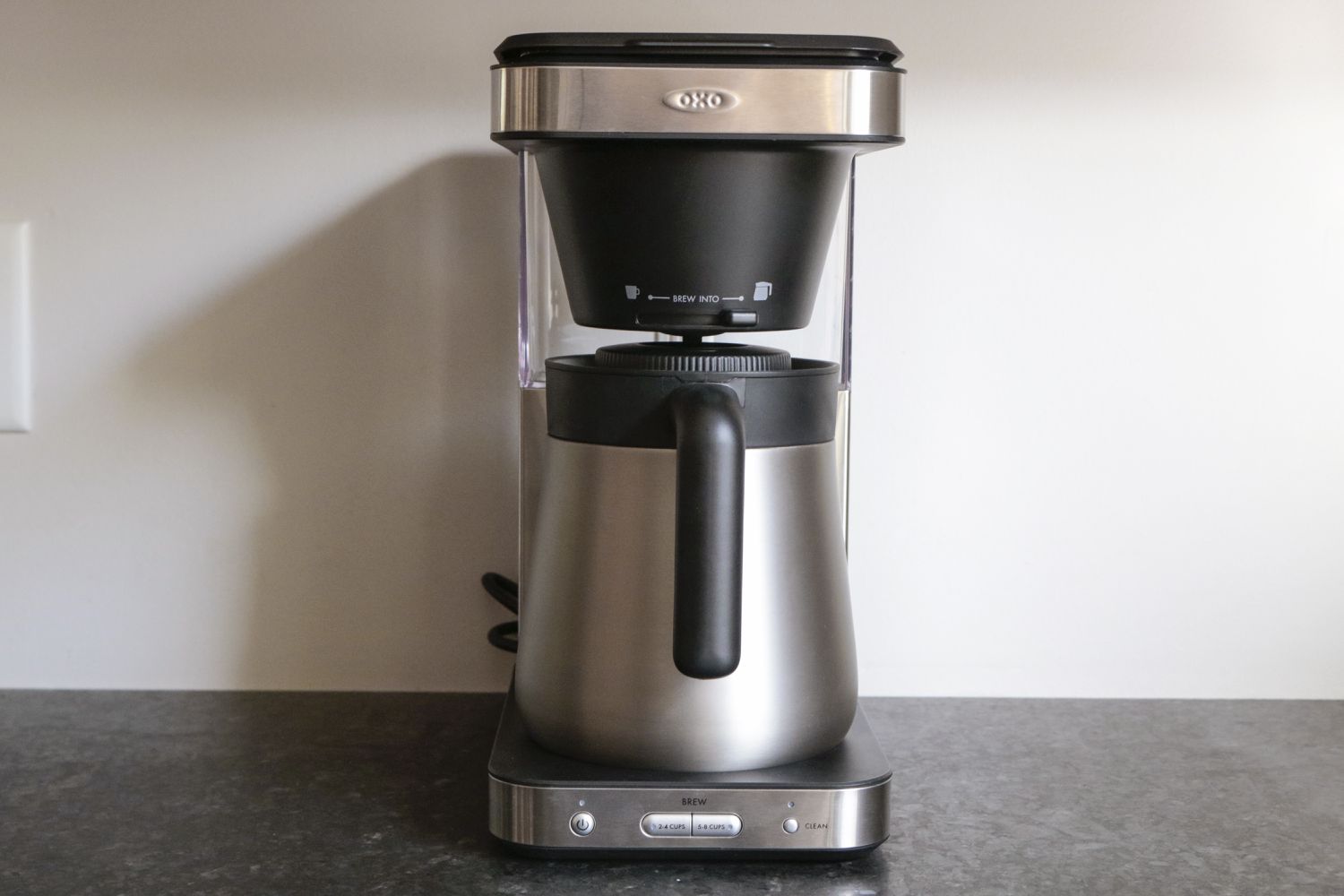 the oxo 8-cup brewer on a grey countertop