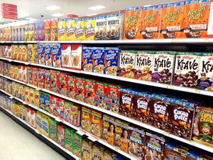 A cereal aisle in a grocery store.