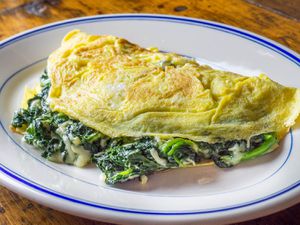 A homemade Florentine omelette with spinach and cheese.