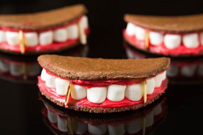 Three vampire mouth sandwich cookies