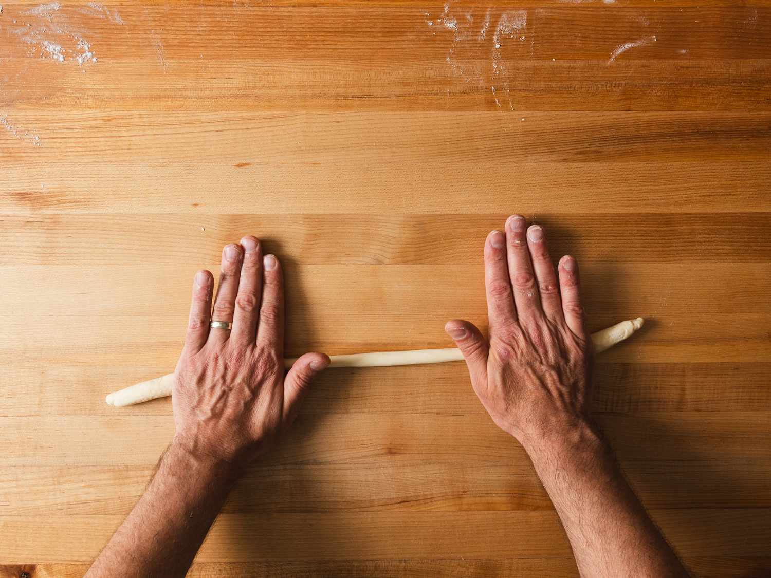 Overhead view of rolling dough