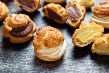 A table of various styles of cream puffs