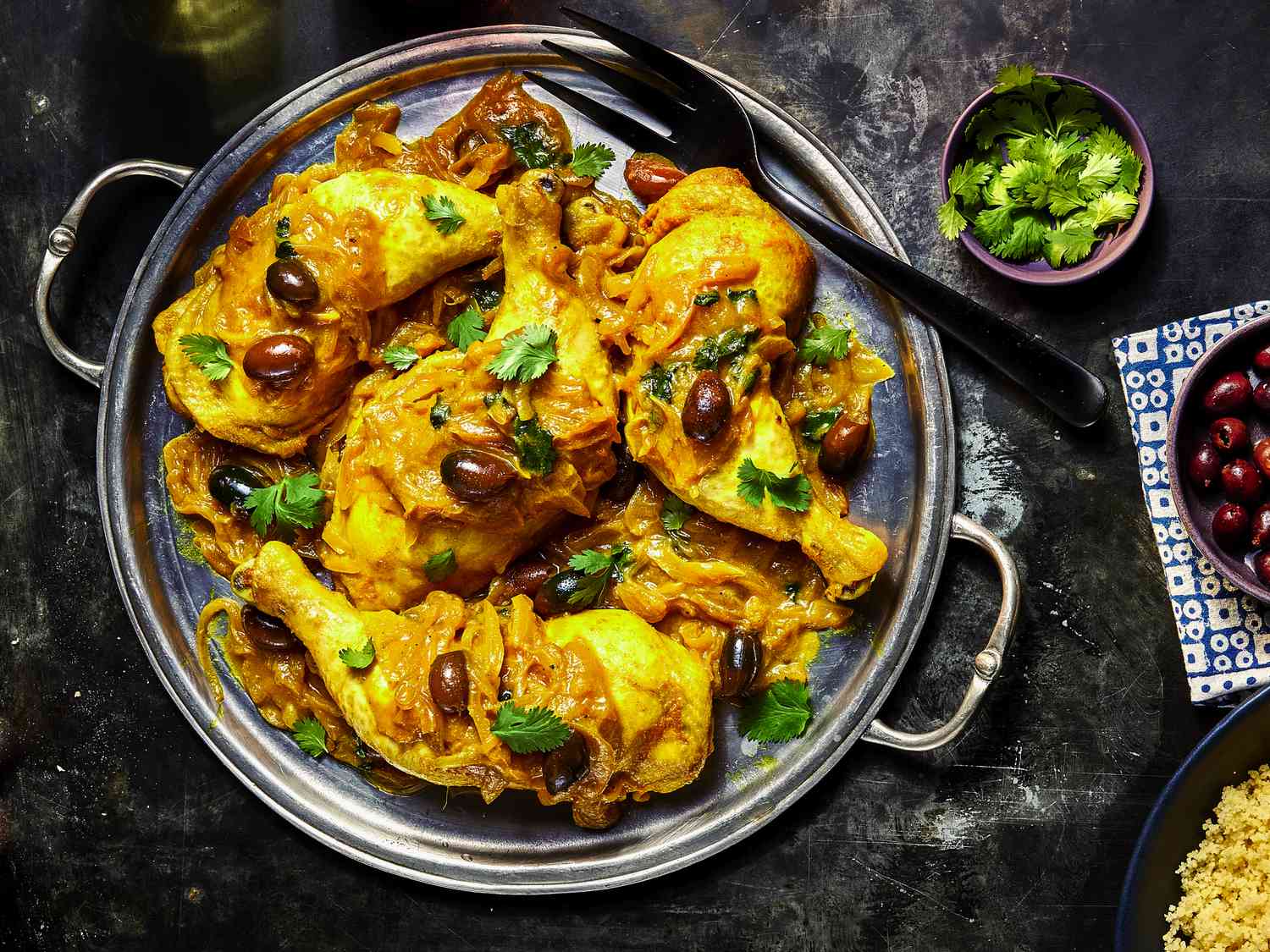 Overhead view of Chicken M’qualli Tagine on a platter