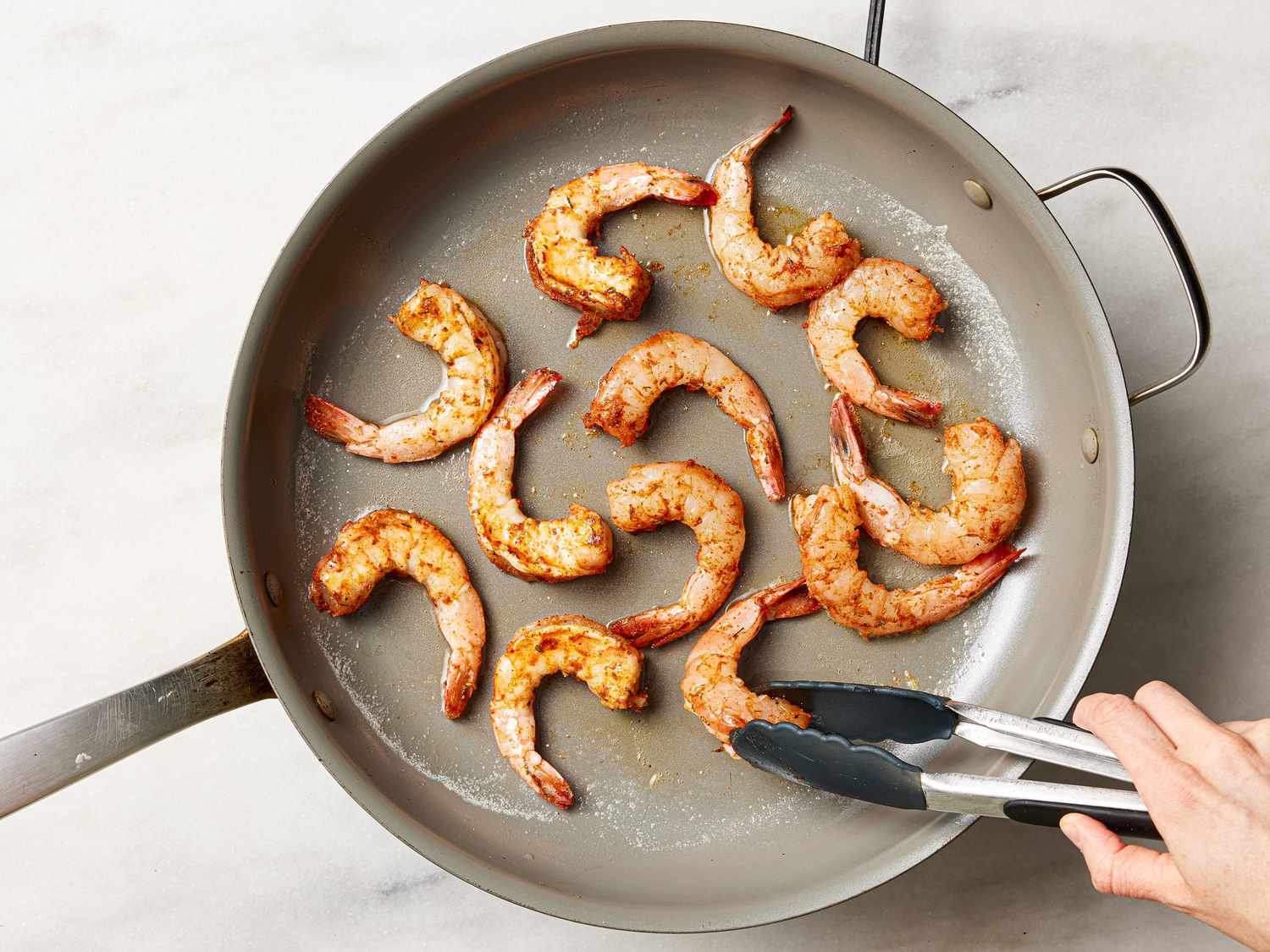 Shrimp in a nonstick pan.