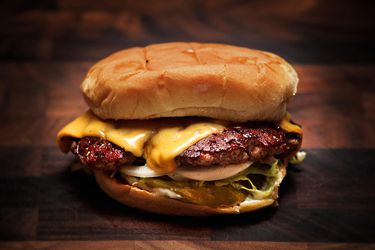 Close-up of a hamburger with cheese on it