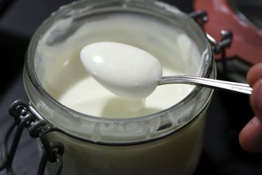 A jar of homemade crème fraîche.