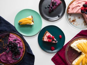 Overhead of slices of no-bake cheesecake made with freeze-dried fruit.