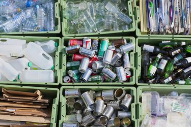 recycling bins with items sorting