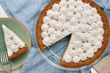 Vegan Key lime pie with one slice removed (slice is alongside on a plate)