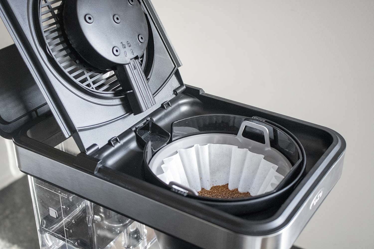A look at the OXO 8-Cup's brewing basket with coffee in it