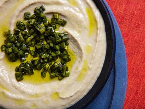 Overhead, close up view of garlic scape hummus