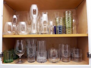 interior of cabinet with a variety of glassware