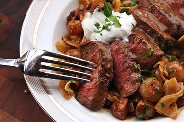 A plate of beef stroganoff.