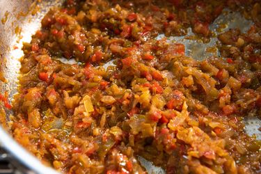 Cooked sofrito in a skillet.