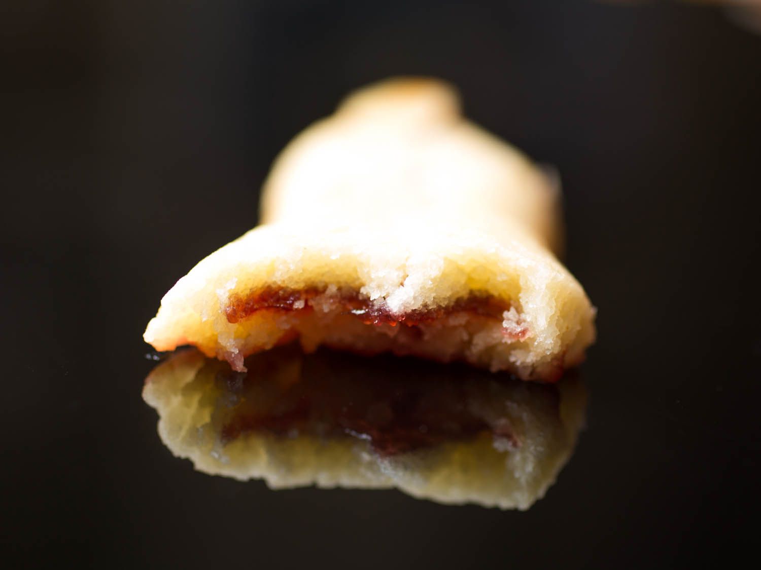 Close up cross section of a with finger shortbread cookie.